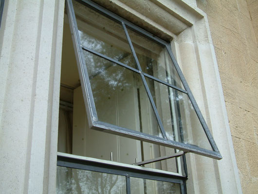Bespoke window design in stainless steel.