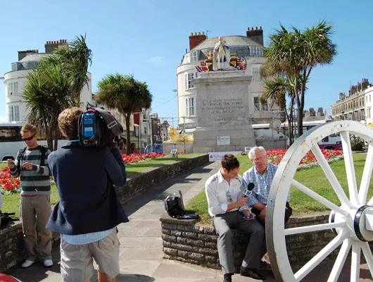 BBC Countryfile film crew following the restoration of the historic George III monument
