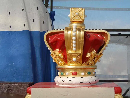 The crown gilded and painted using traditional lead based paint