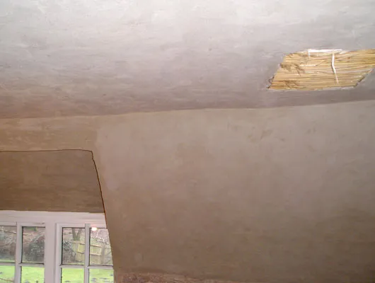 LIME PLASTERING: Finished basecoat ready for lime plaster. NB Patch omitted for smoke detector